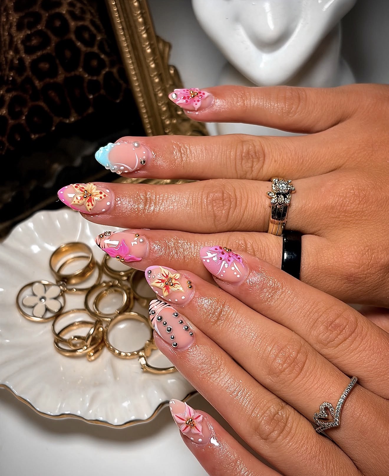 Almond Gel-X set with 3D gold-centred floral art in pink and cream